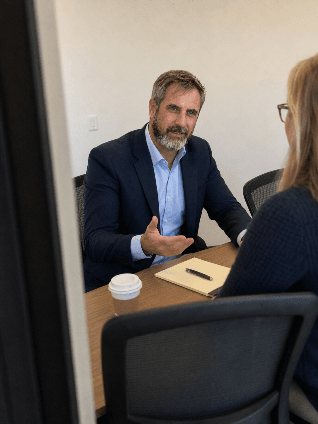 A TX Commercial Insurance agent going over quote options with a business owner